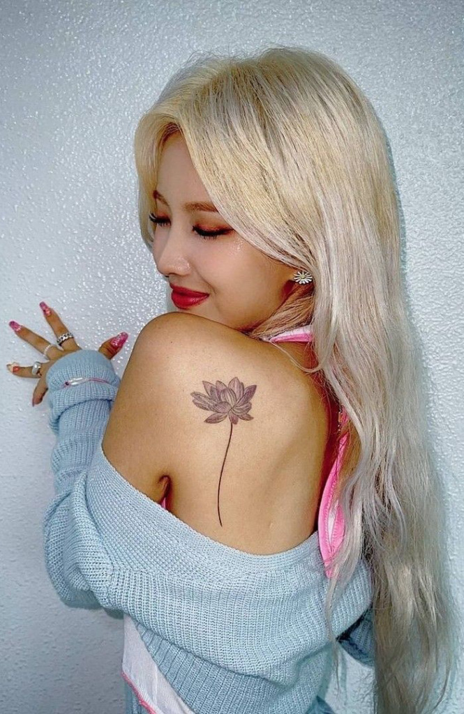 Soyeon's butterfly tattoo