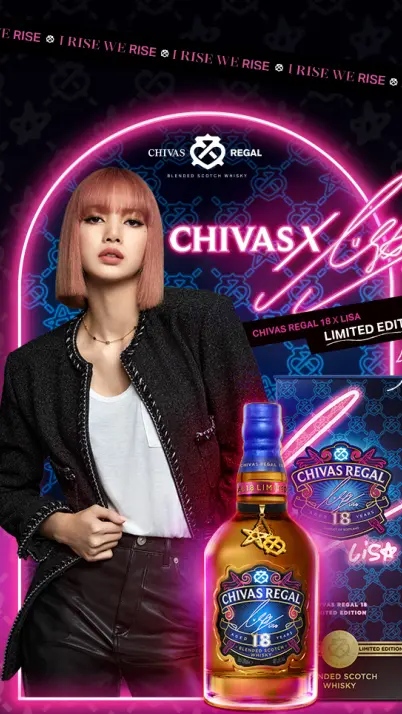 Lisa in black blazer with gold jewelry